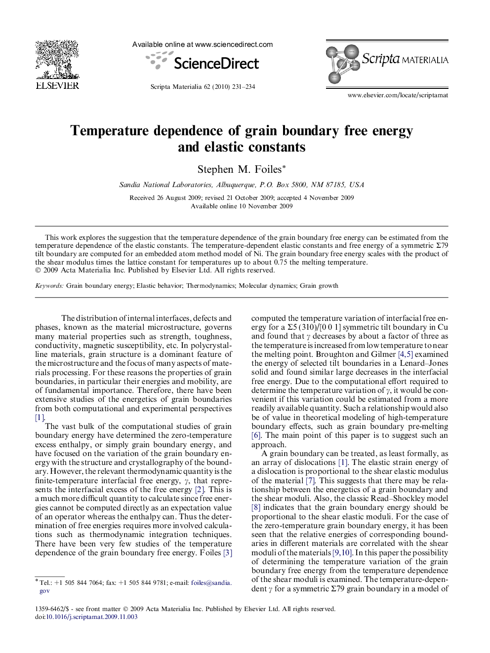 Temperature dependence of grain boundary free energy and elastic constants