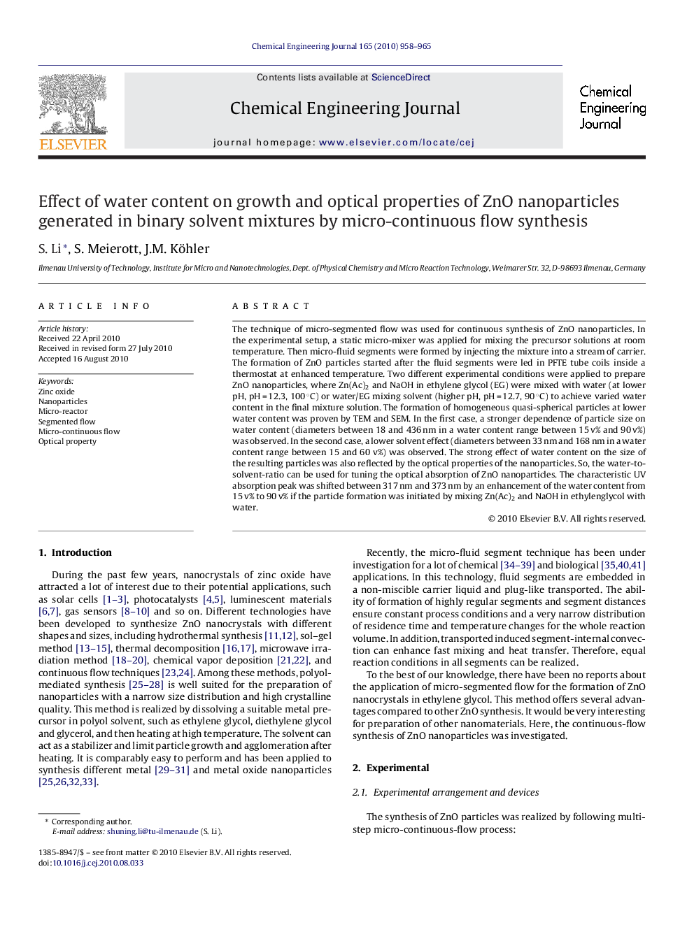 Effect of water content on growth and optical properties of ZnO nanoparticles generated in binary solvent mixtures by micro-continuous flow synthesis