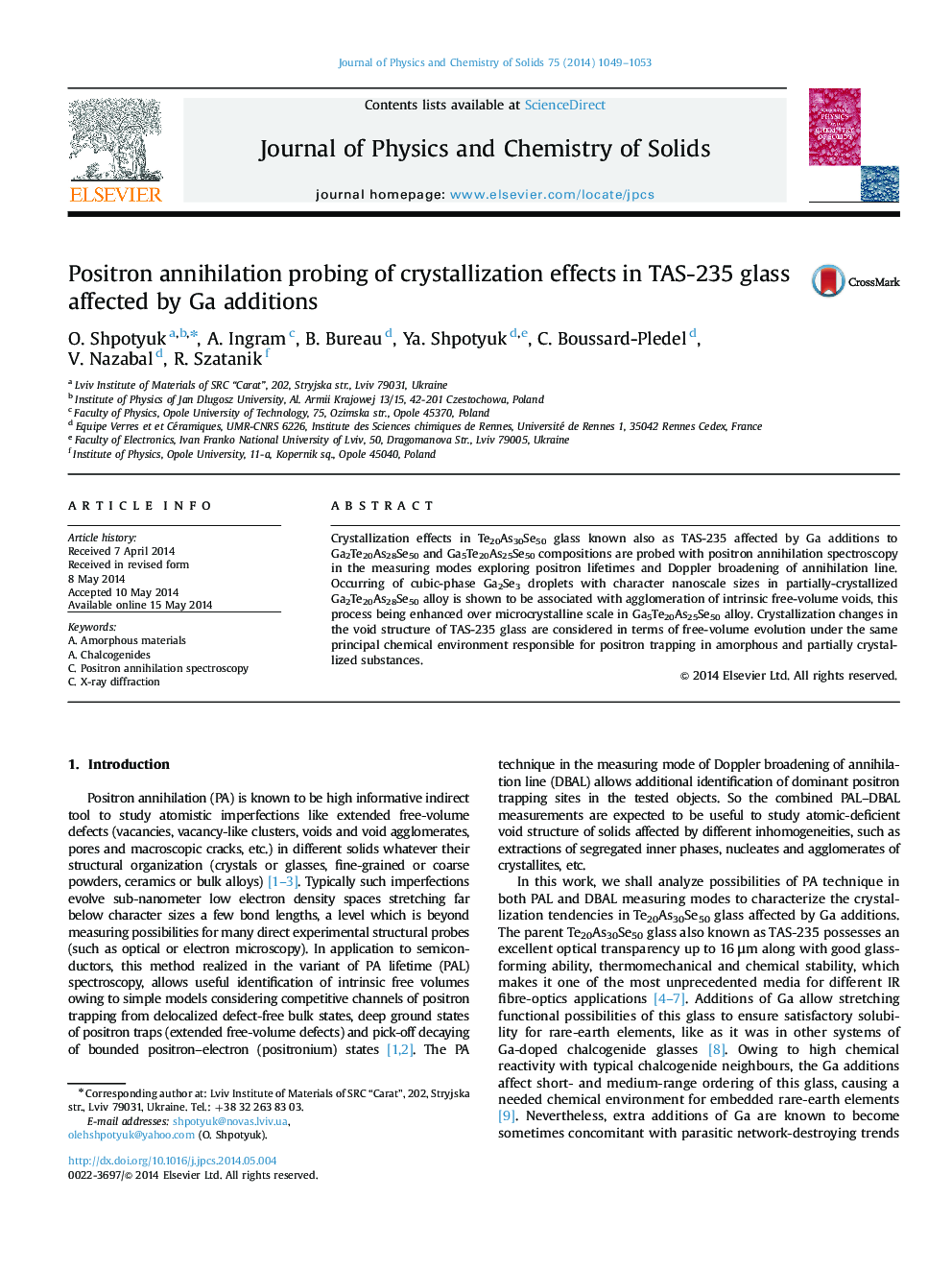 Positron annihilation probing of crystallization effects in TAS-235 glass affected by Ga additions