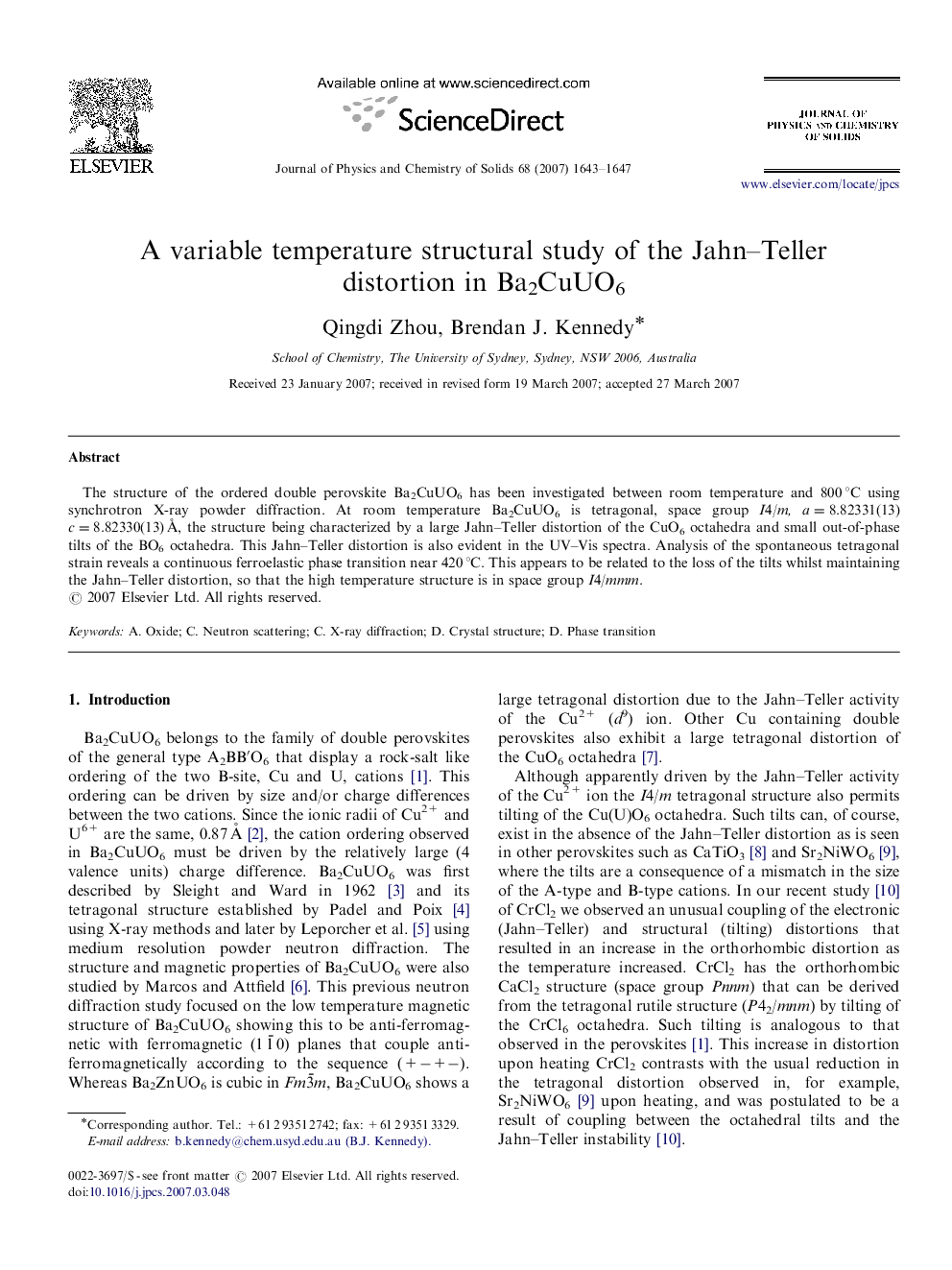 A variable temperature structural study of the Jahn–Teller distortion in Ba2CuUO6