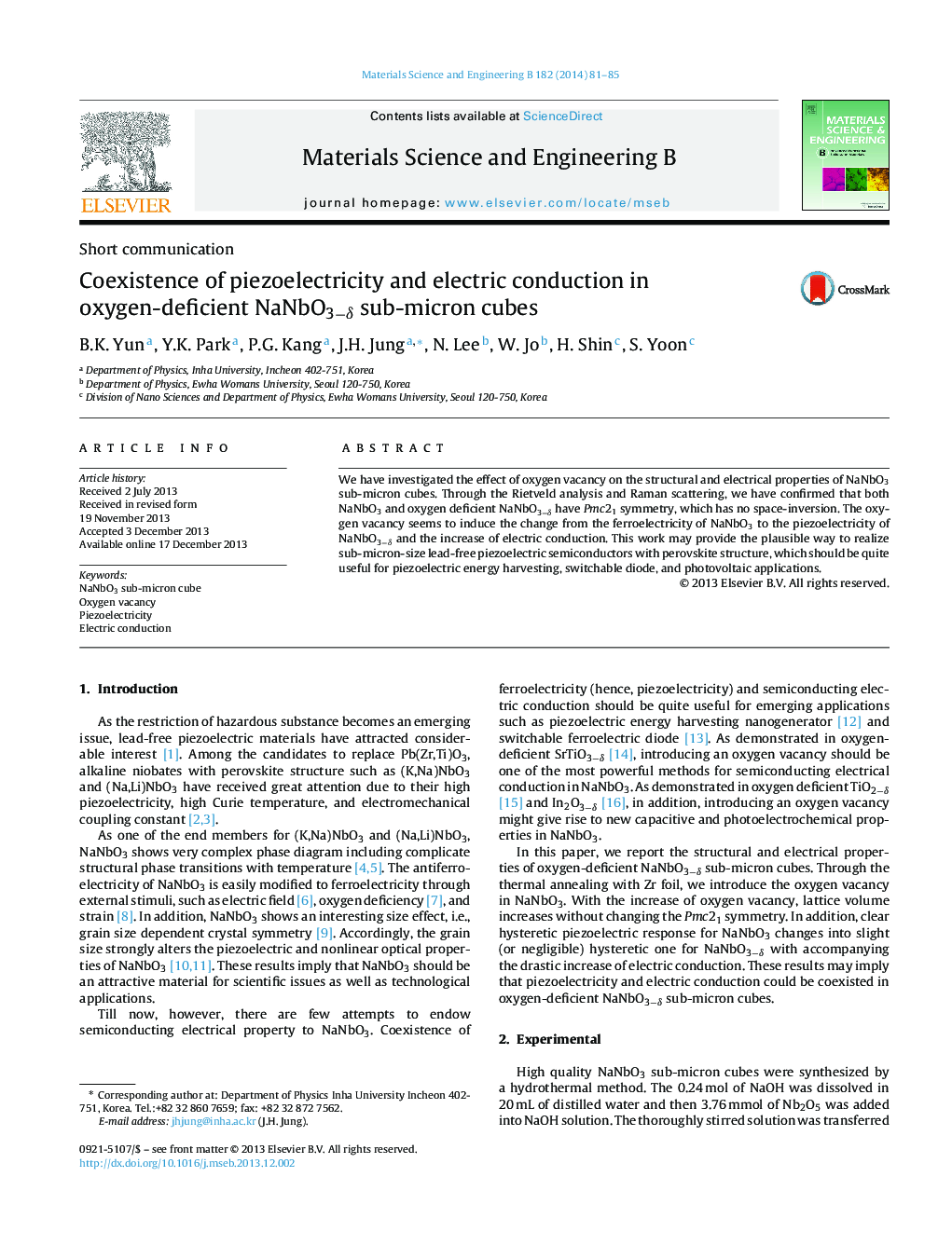 Coexistence of piezoelectricity and electric conduction in oxygen-deficient NaNbO3−δ sub-micron cubes