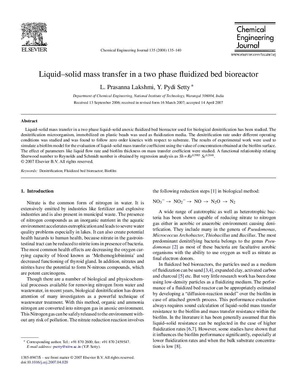 Liquid–solid mass transfer in a two phase fluidized bed bioreactor