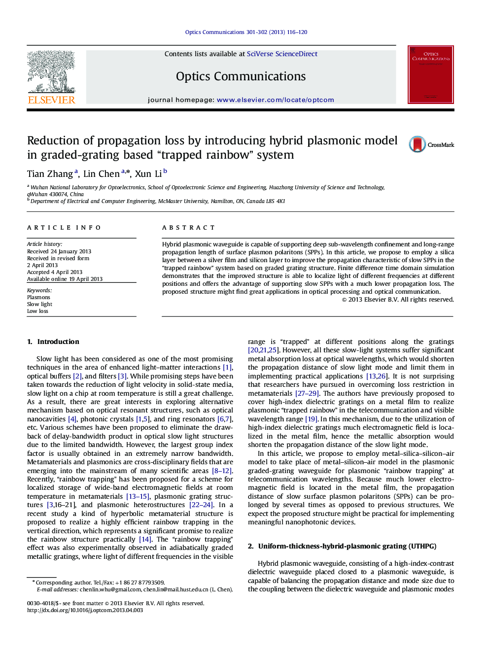 Reduction of propagation loss by introducing hybrid plasmonic model in graded-grating based “trapped rainbow” system