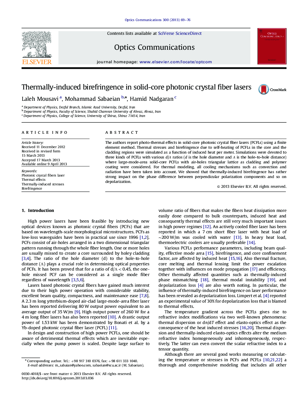 Thermally-induced birefringence in solid-core photonic crystal fiber lasers