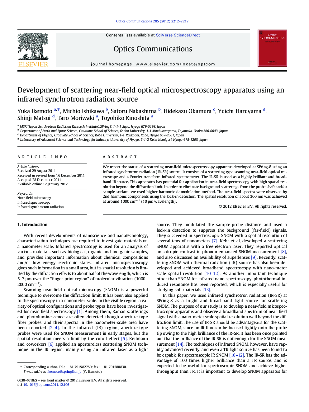 Development of scattering near-field optical microspectroscopy apparatus using an infrared synchrotron radiation source