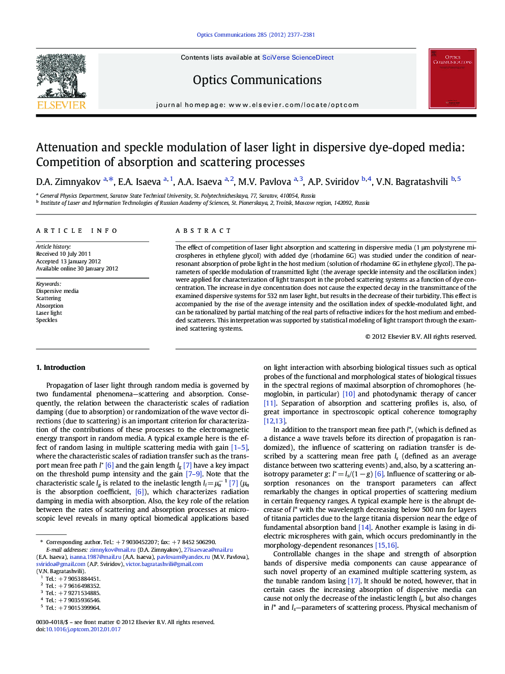 Attenuation and speckle modulation of laser light in dispersive dye-doped media: Competition of absorption and scattering processes