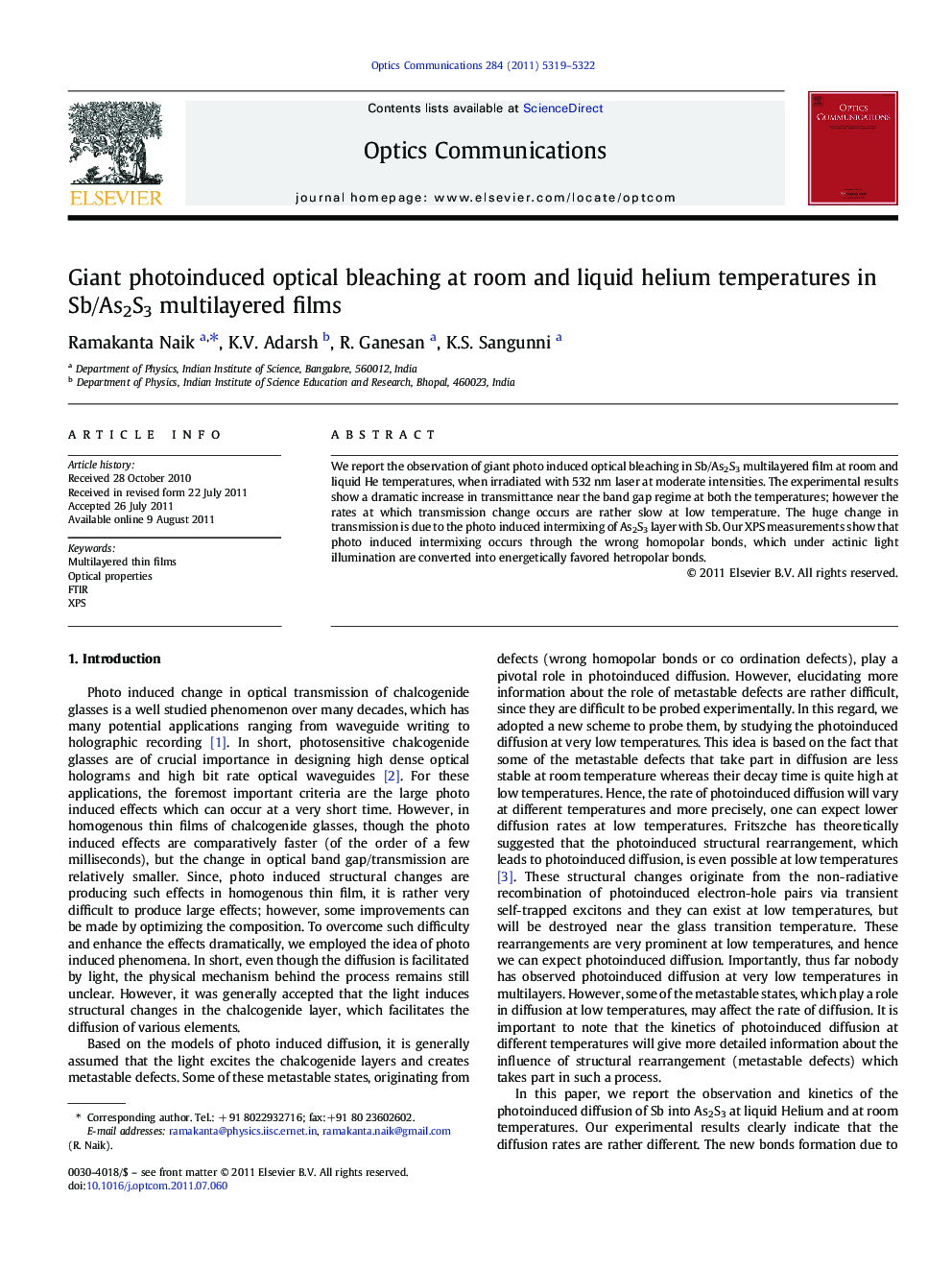 Giant photoinduced optical bleaching at room and liquid helium temperatures in Sb/As2S3 multilayered films