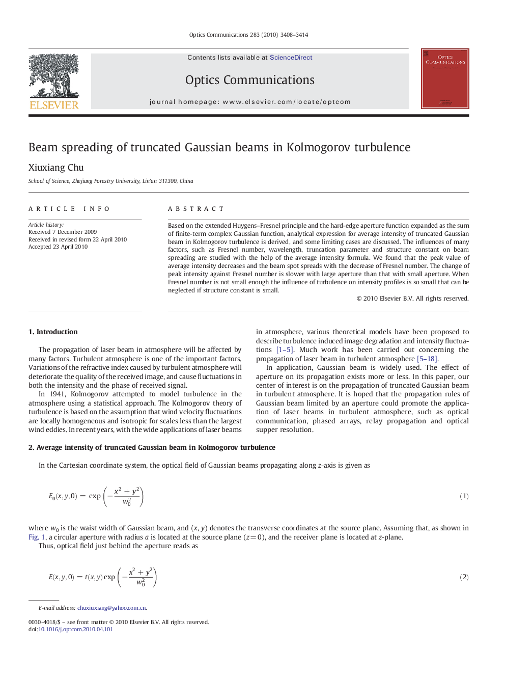 Beam spreading of truncated Gaussian beams in Kolmogorov turbulence