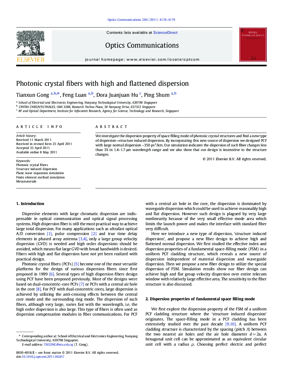 Photonic crystal fibers with high and flattened dispersion