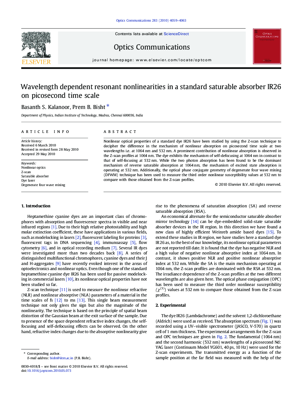 Wavelength dependent resonant nonlinearities in a standard saturable absorber IR26 on picosecond time scale