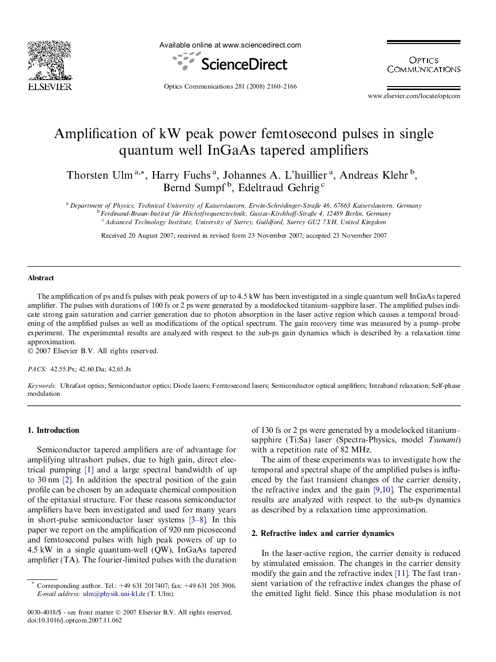 Amplification of kW peak power femtosecond pulses in single quantum well InGaAs tapered amplifiers