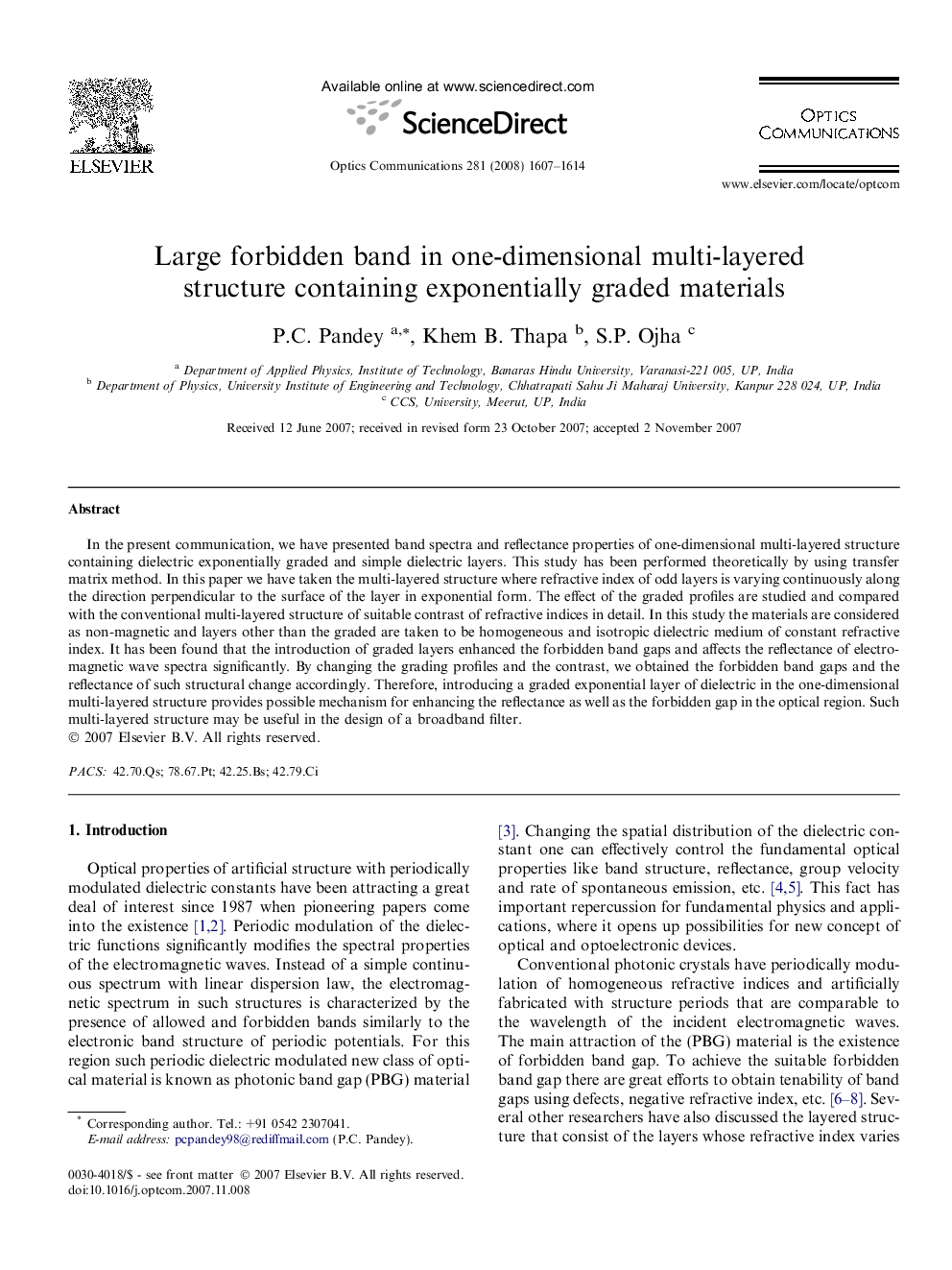 Large forbidden band in one-dimensional multi-layered structure containing exponentially graded materials