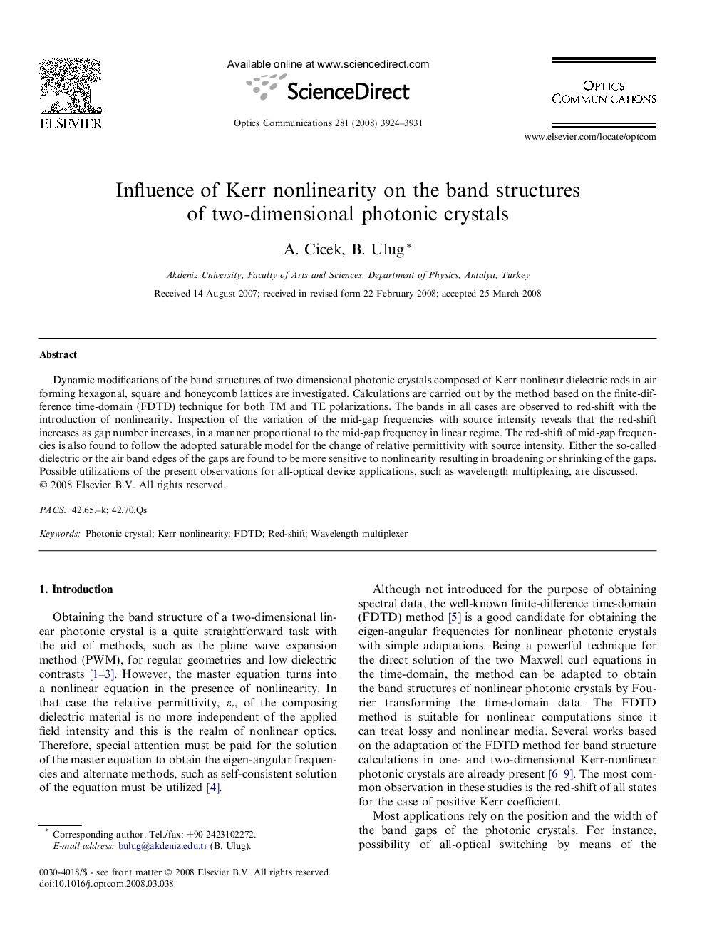 Influence of Kerr nonlinearity on the band structures of two-dimensional photonic crystals