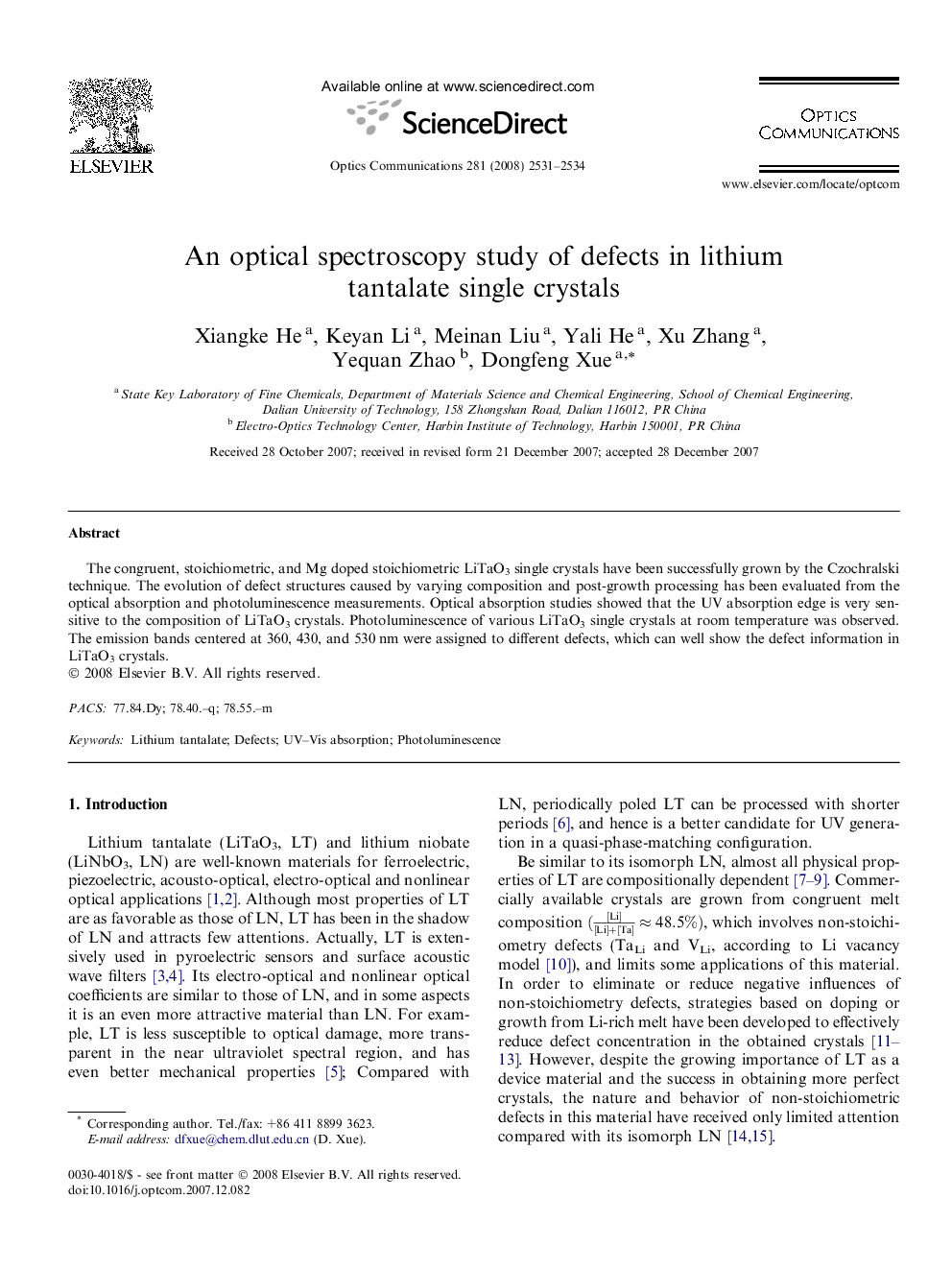 An optical spectroscopy study of defects in lithium tantalate single crystals