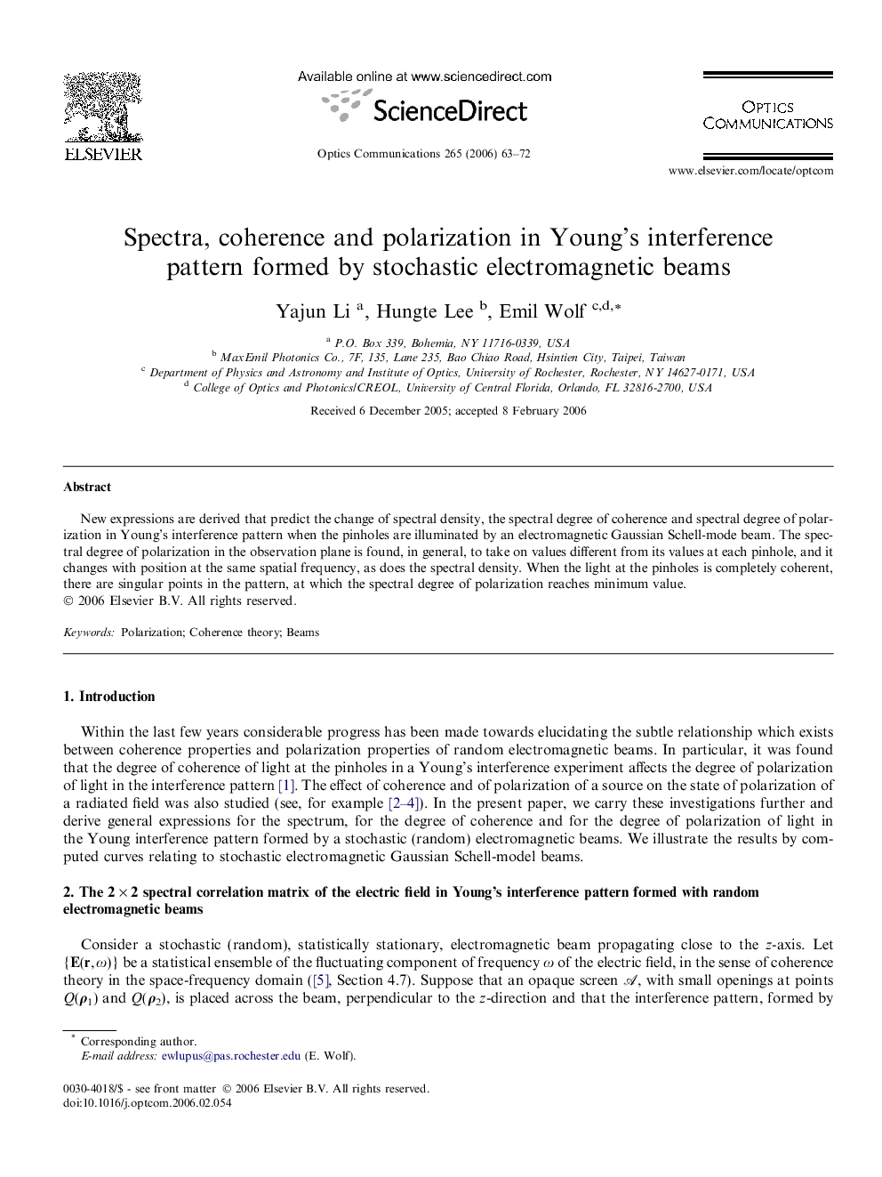 Spectra, coherence and polarization in Young’s interference pattern formed by stochastic electromagnetic beams