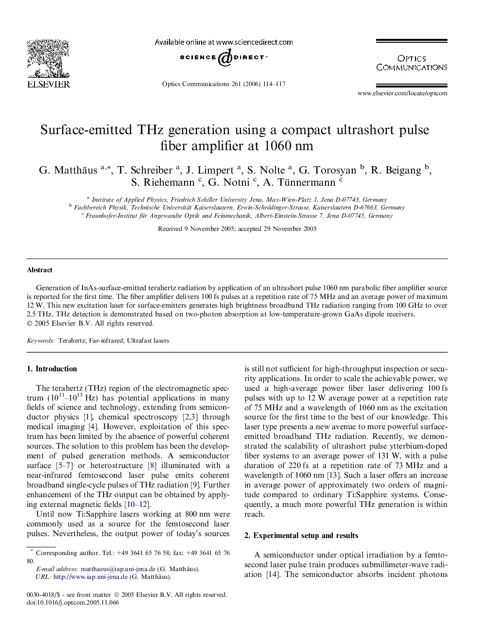 Surface-emitted THz generation using a compact ultrashort pulse fiber amplifier at 1060 nm