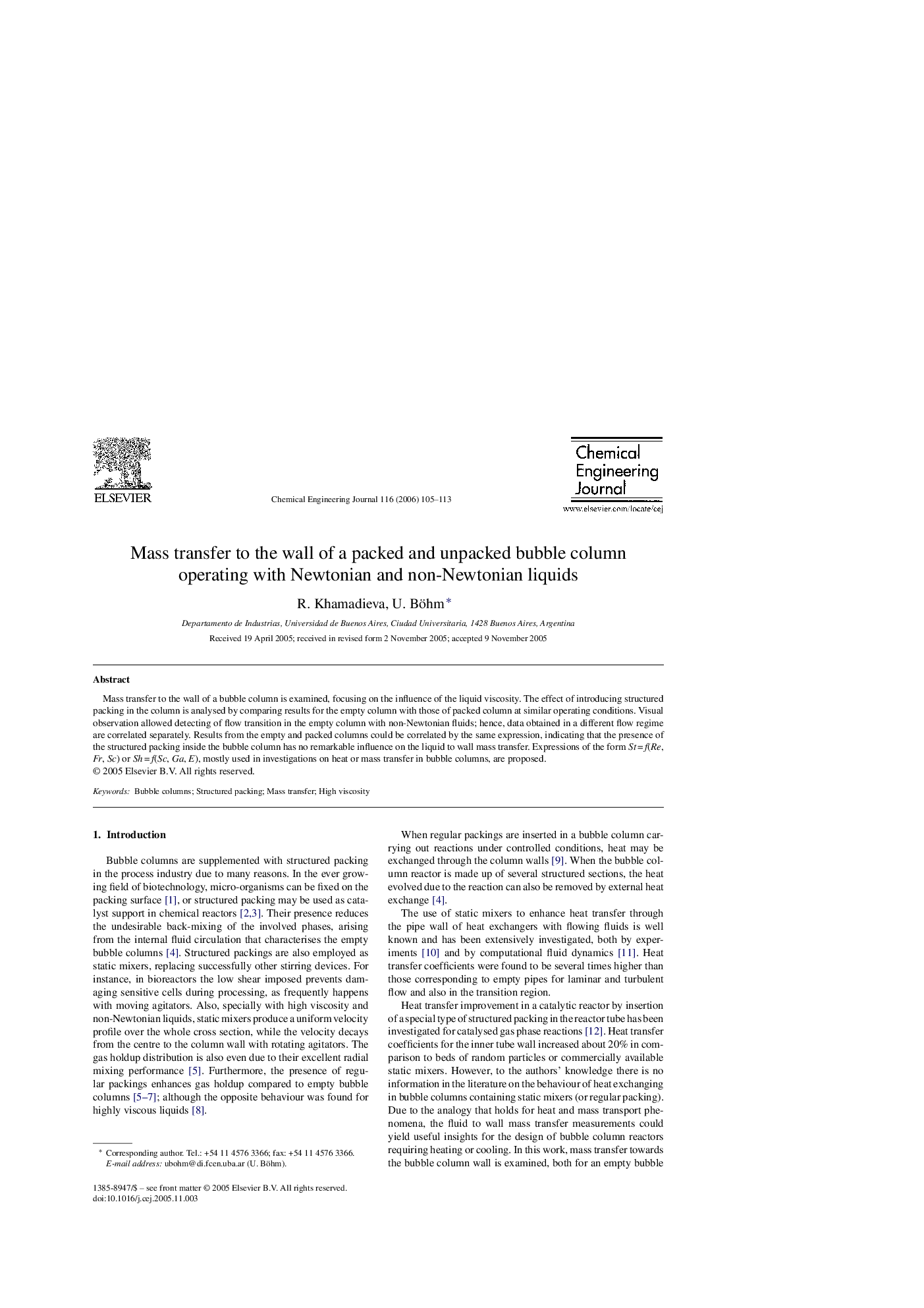 Mass transfer to the wall of a packed and unpacked bubble column operating with Newtonian and non-Newtonian liquids