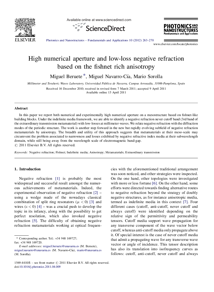 High numerical aperture and low-loss negative refraction based on the fishnet rich anisotropy