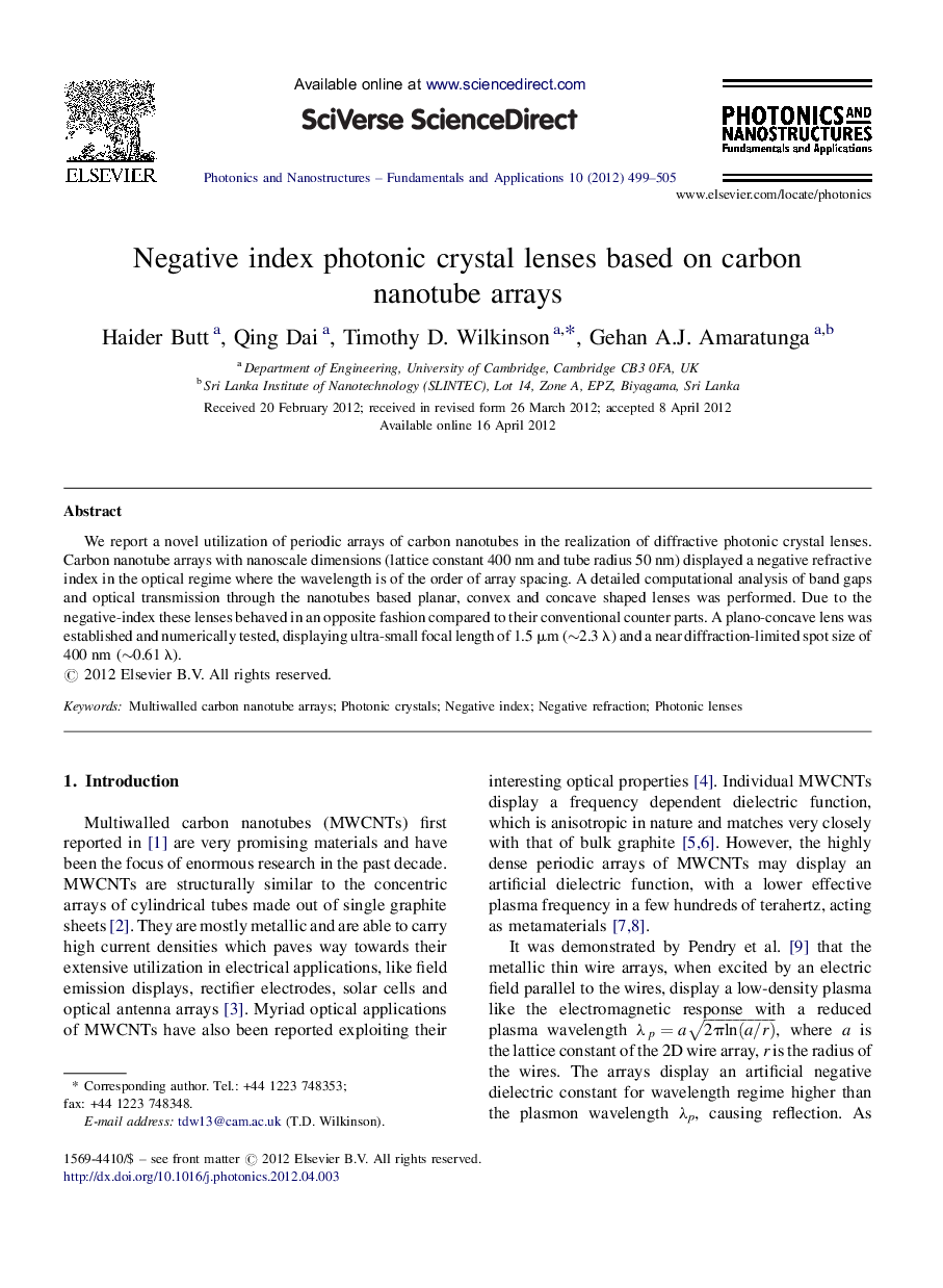 Negative index photonic crystal lenses based on carbon nanotube arrays