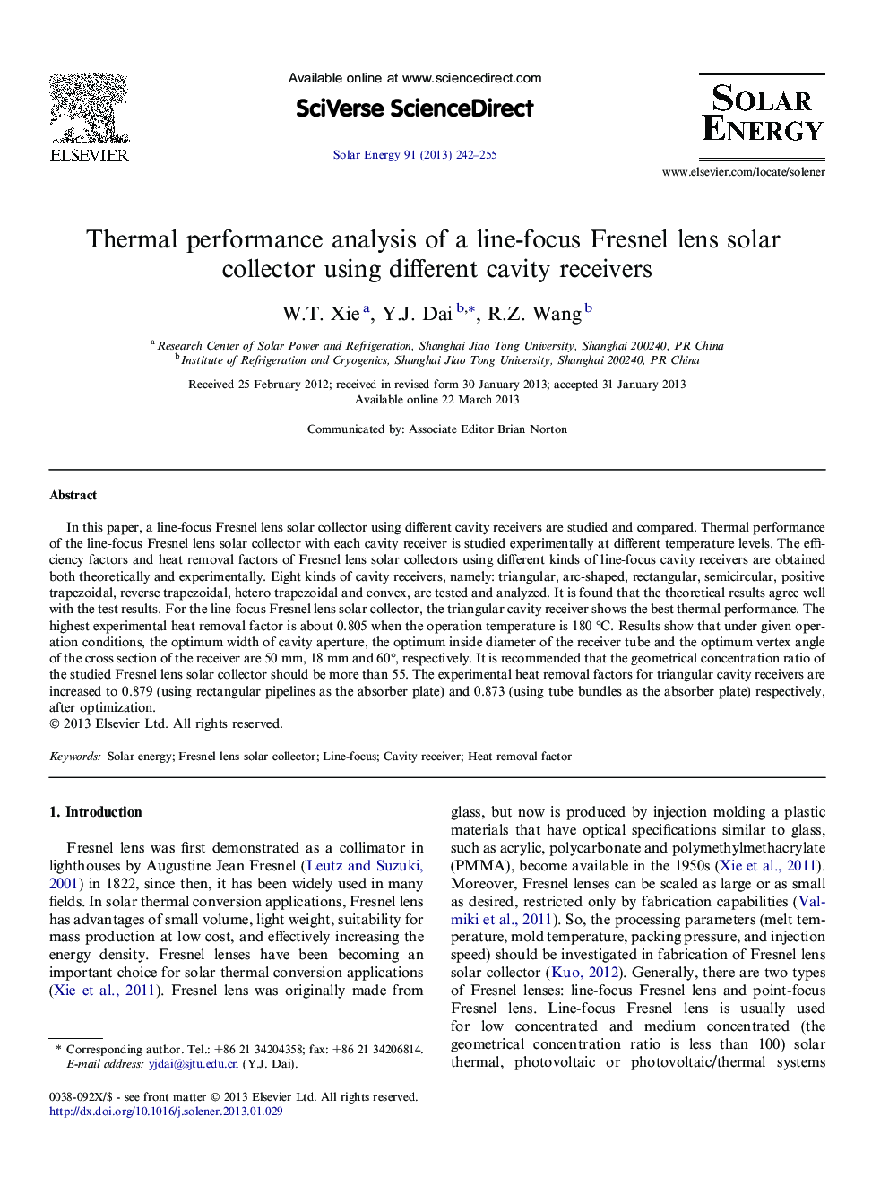 Thermal performance analysis of a line-focus Fresnel lens solar collector using different cavity receivers