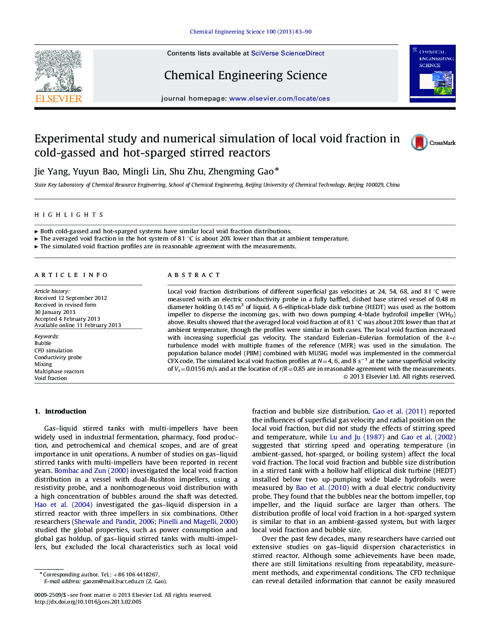 Experimental study and numerical simulation of local void fraction in cold-gassed and hot-sparged stirred reactors