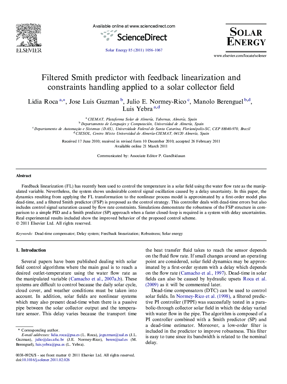 Filtered Smith predictor with feedback linearization and constraints handling applied to a solar collector field