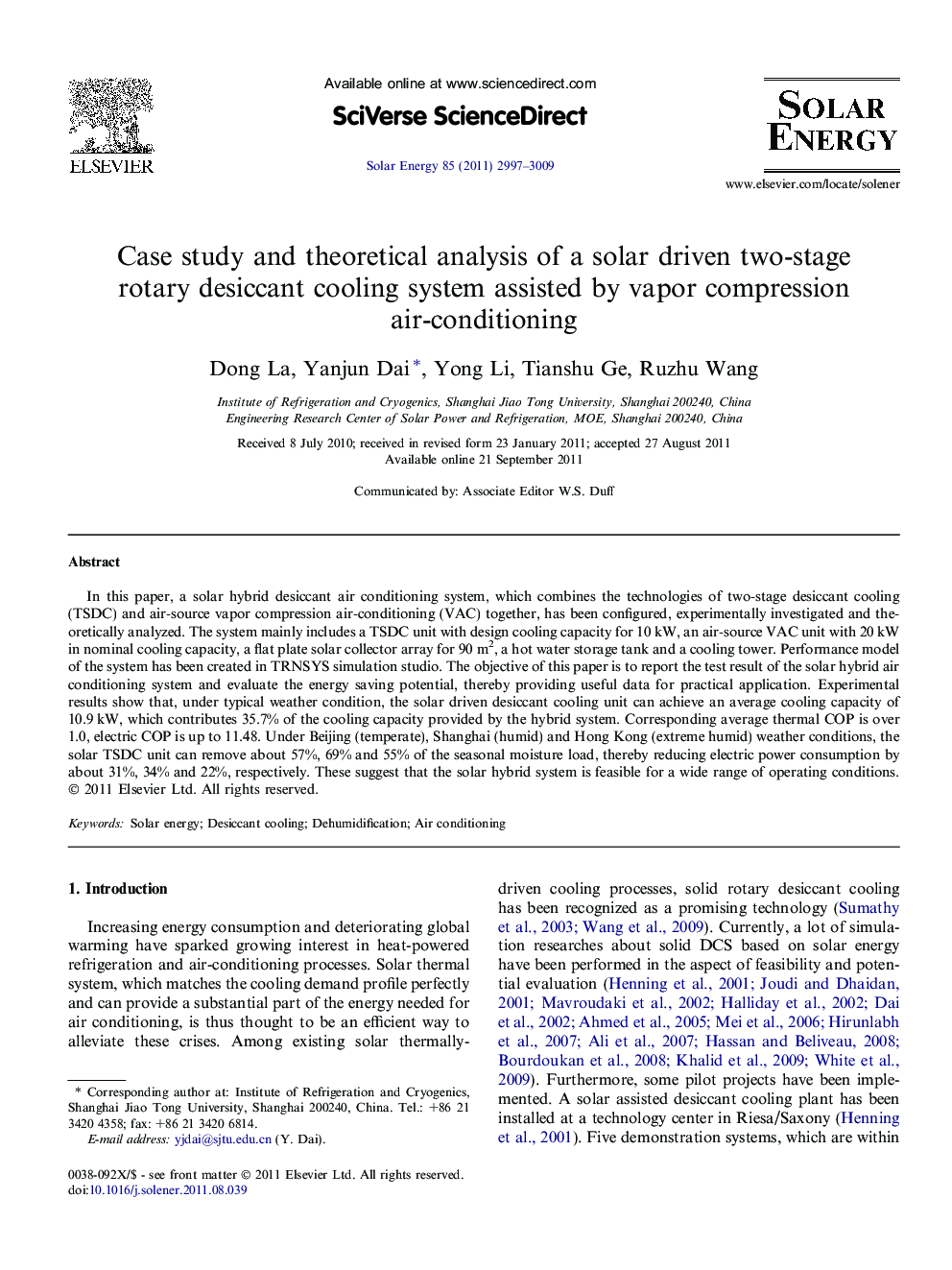 Case study and theoretical analysis of a solar driven two-stage rotary desiccant cooling system assisted by vapor compression air-conditioning