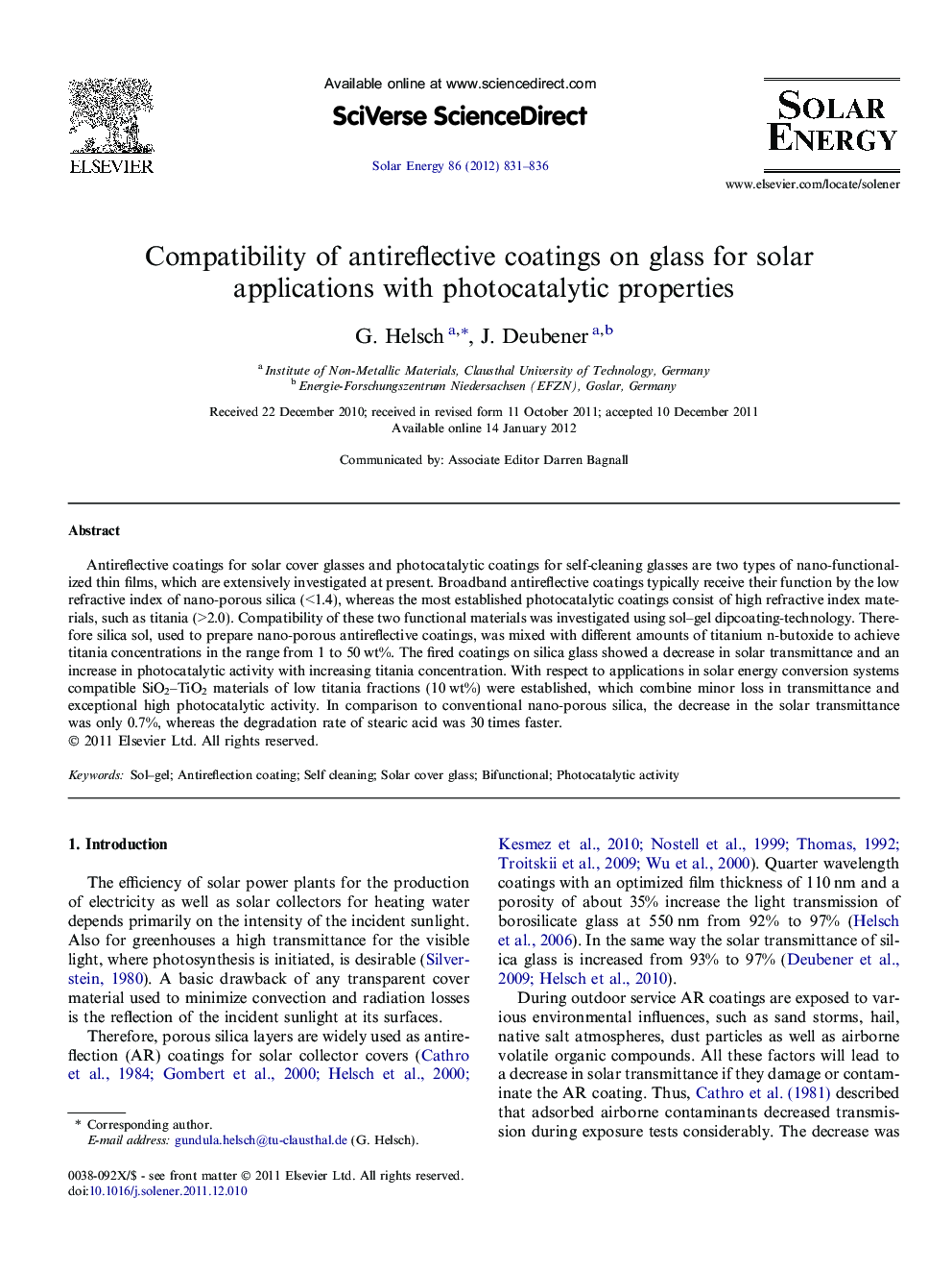 Compatibility of antireflective coatings on glass for solar applications with photocatalytic properties