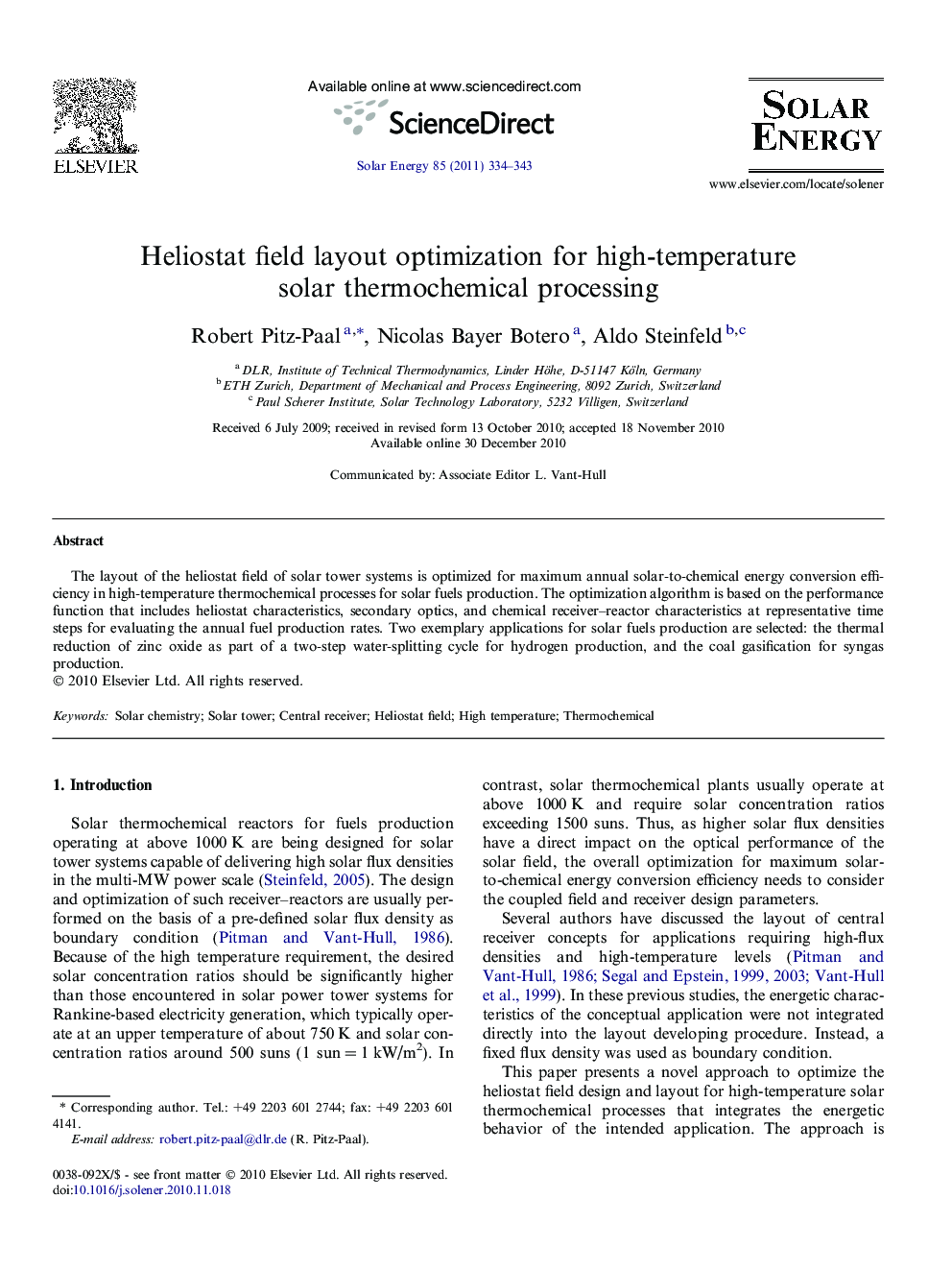 Heliostat field layout optimization for high-temperature solar thermochemical processing