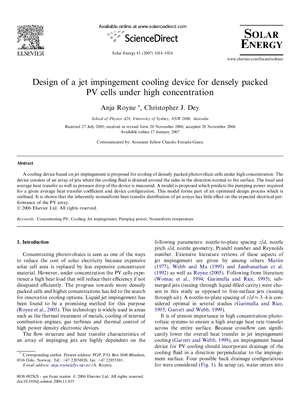 Design of a jet impingement cooling device for densely packed PV cells under high concentration