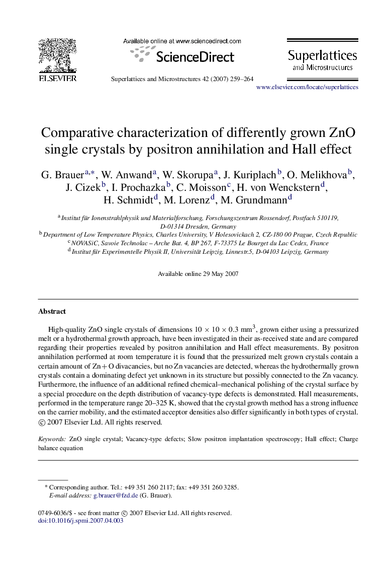 Comparative characterization of differently grown ZnO single crystals by positron annihilation and Hall effect