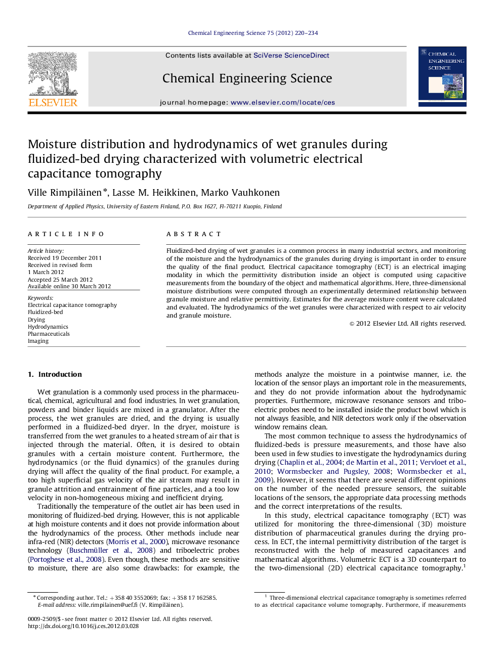 Moisture distribution and hydrodynamics of wet granules during fluidized-bed drying characterized with volumetric electrical capacitance tomography