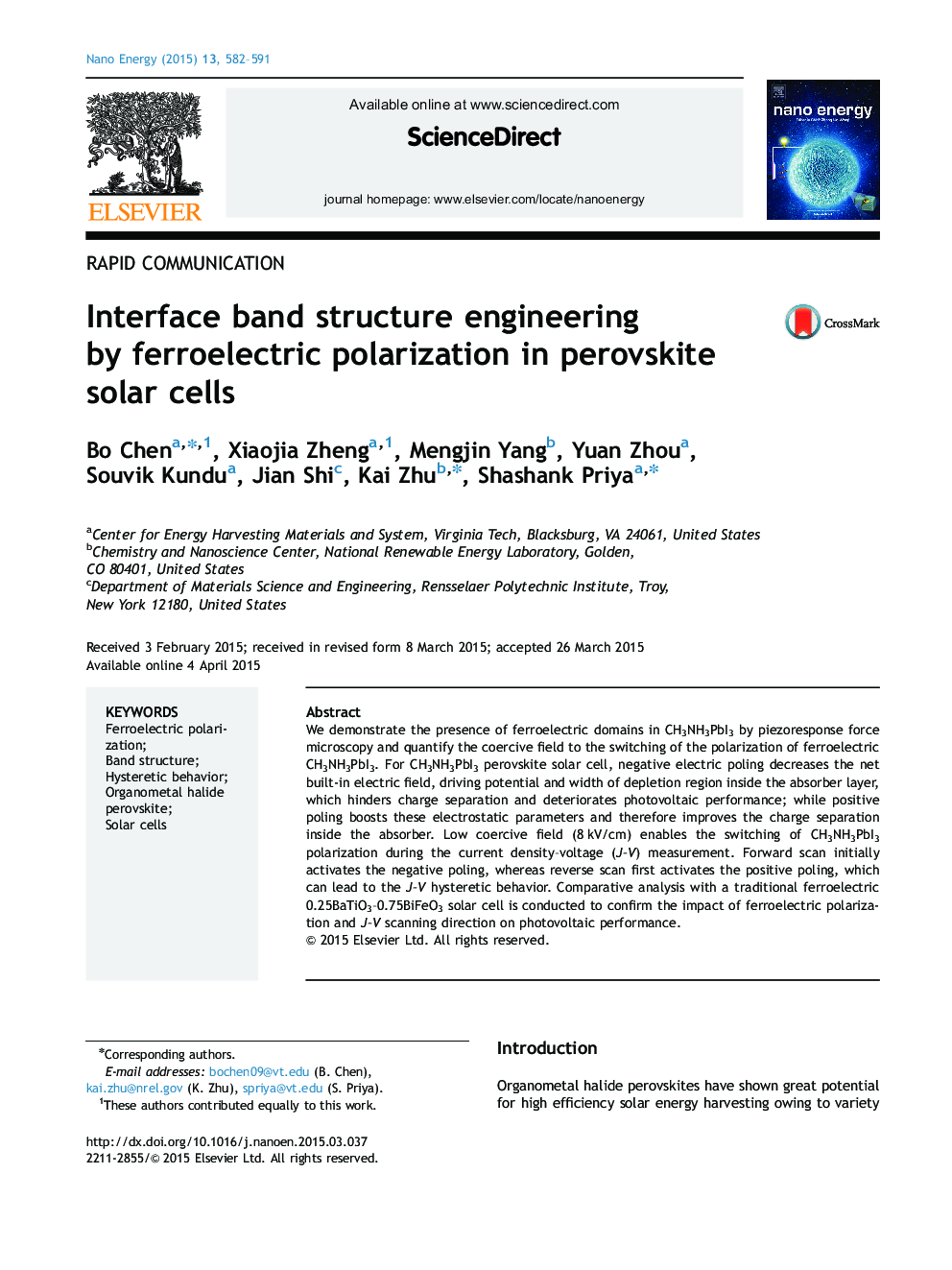 Interface band structure engineering by ferroelectric polarization in perovskite solar cells