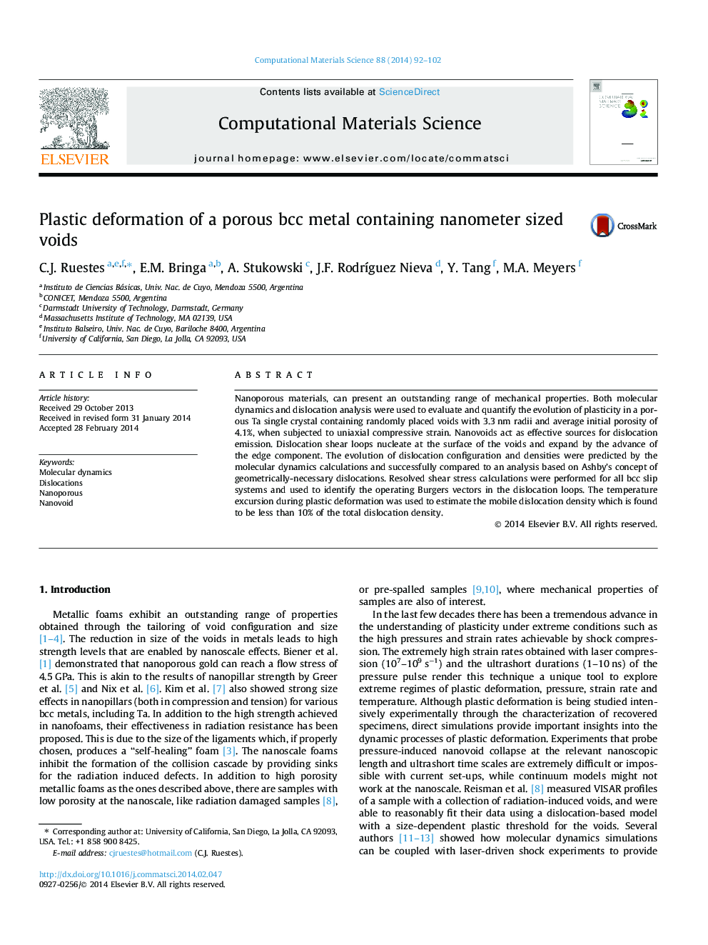 Plastic deformation of a porous bcc metal containing nanometer sized voids