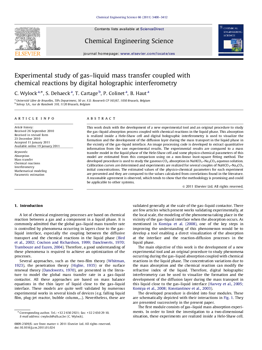 Experimental study of gas–liquid mass transfer coupled with chemical reactions by digital holographic interferometry