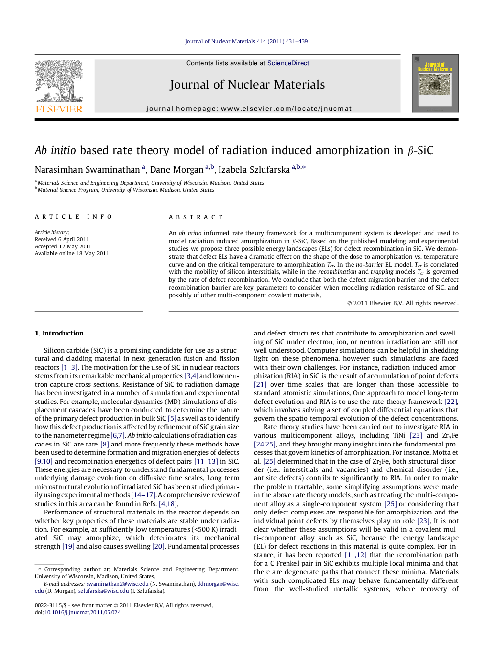 Ab initio based rate theory model of radiation induced amorphization in β-SiC