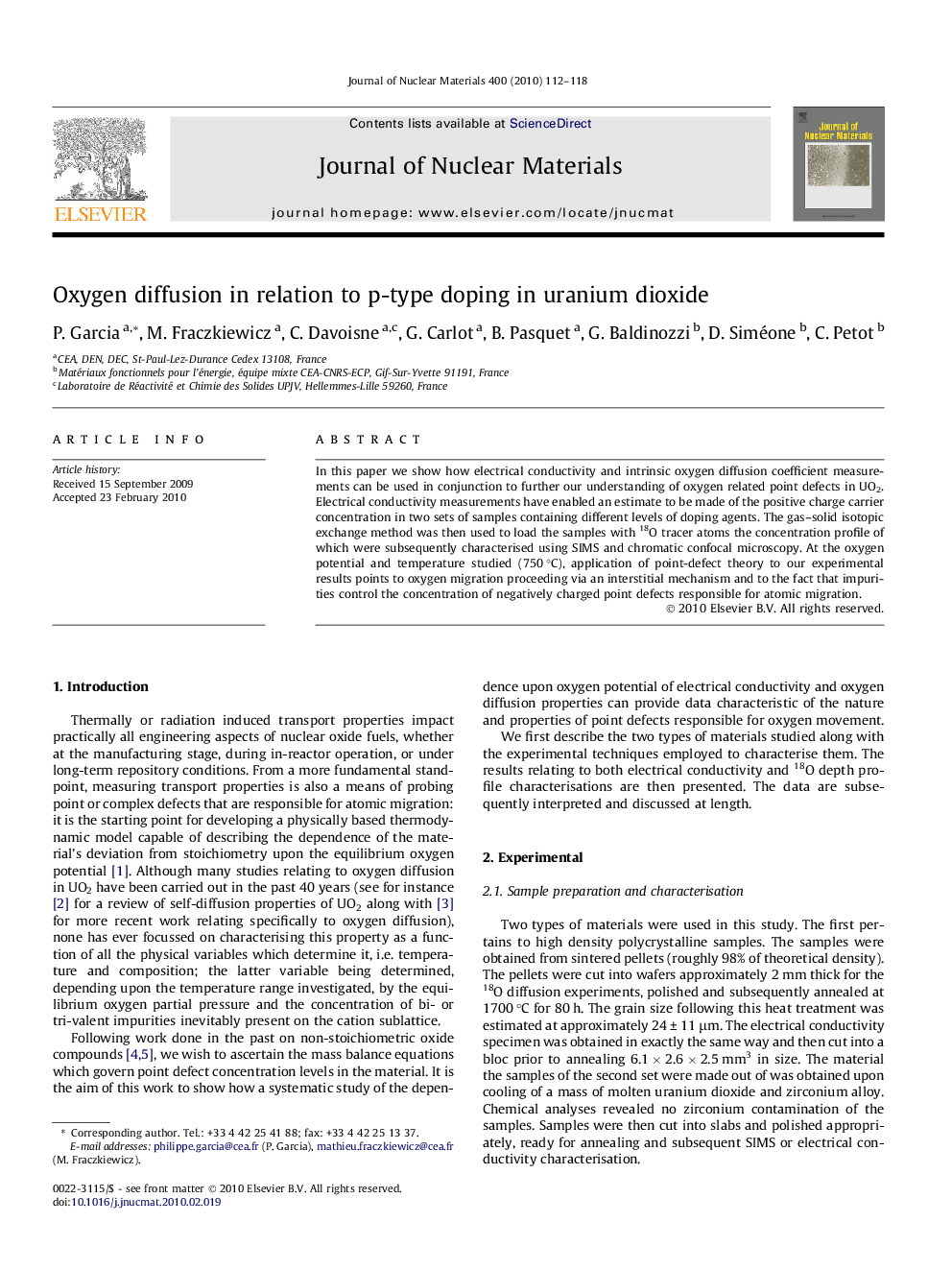 Oxygen diffusion in relation to p-type doping in uranium dioxide