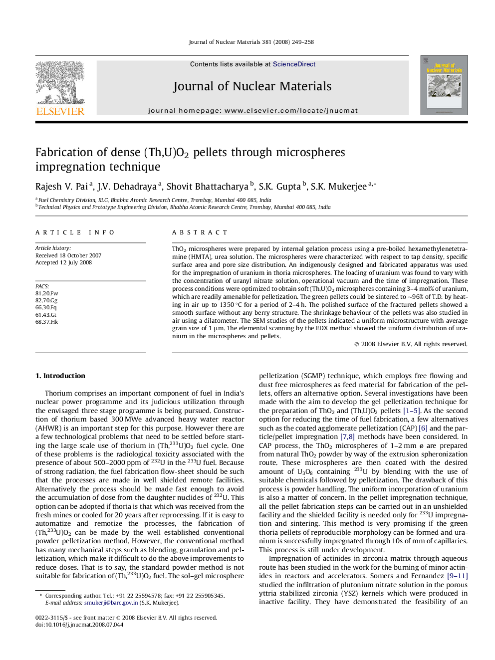Fabrication of dense (Th,U)O2 pellets through microspheres impregnation technique
