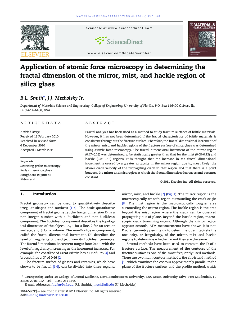 Application of atomic force microscopy in determining the fractal dimension of the mirror, mist, and hackle region of silica glass