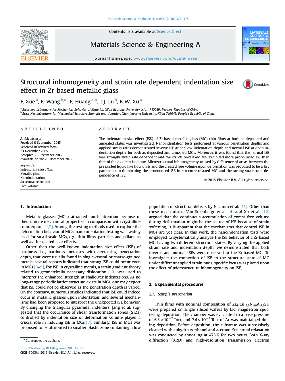 Structural inhomogeneity and strain rate dependent indentation size effect in Zr-based metallic glass