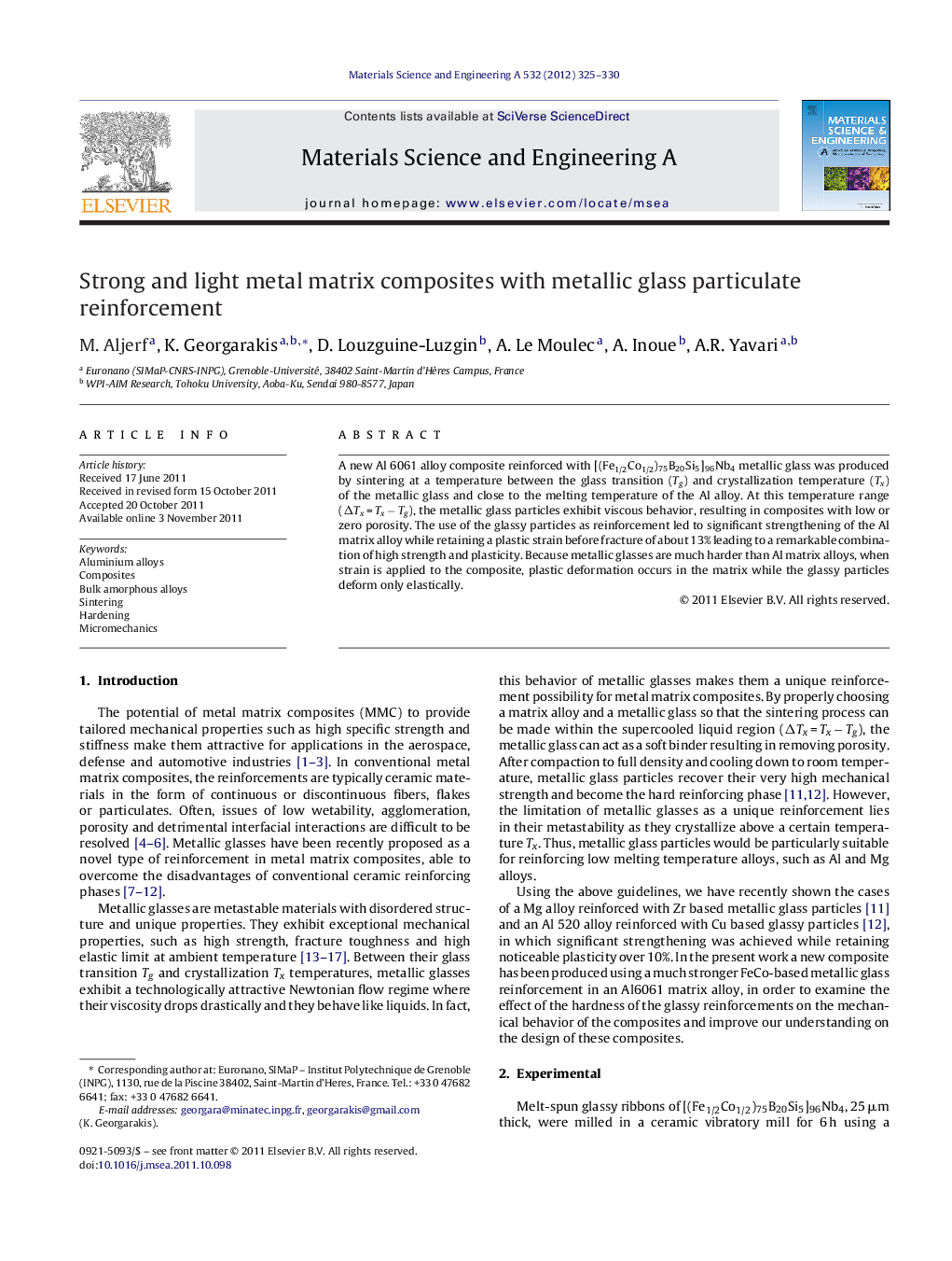 Strong and light metal matrix composites with metallic glass particulate reinforcement