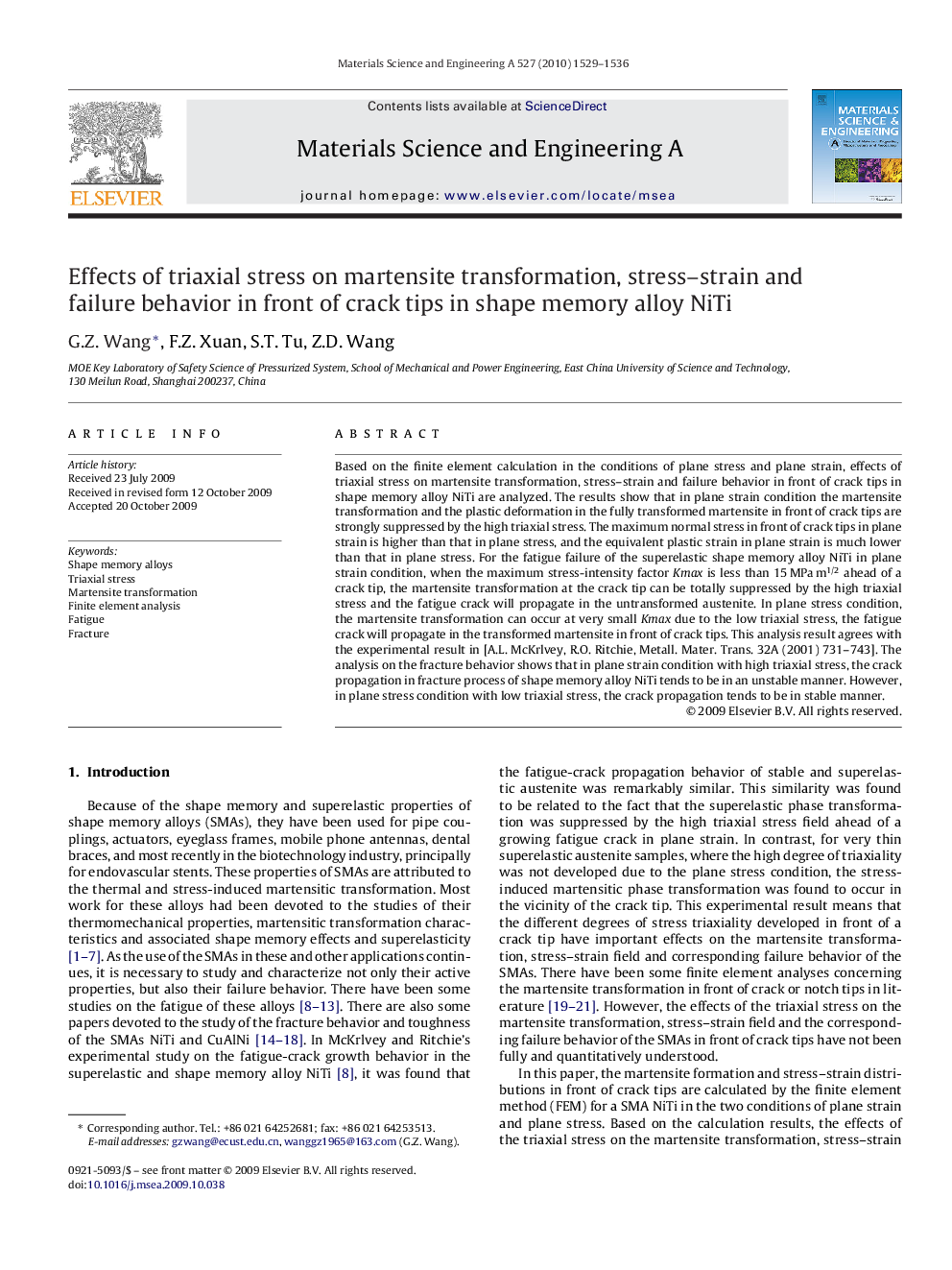 Effects of triaxial stress on martensite transformation, stress–strain and failure behavior in front of crack tips in shape memory alloy NiTi