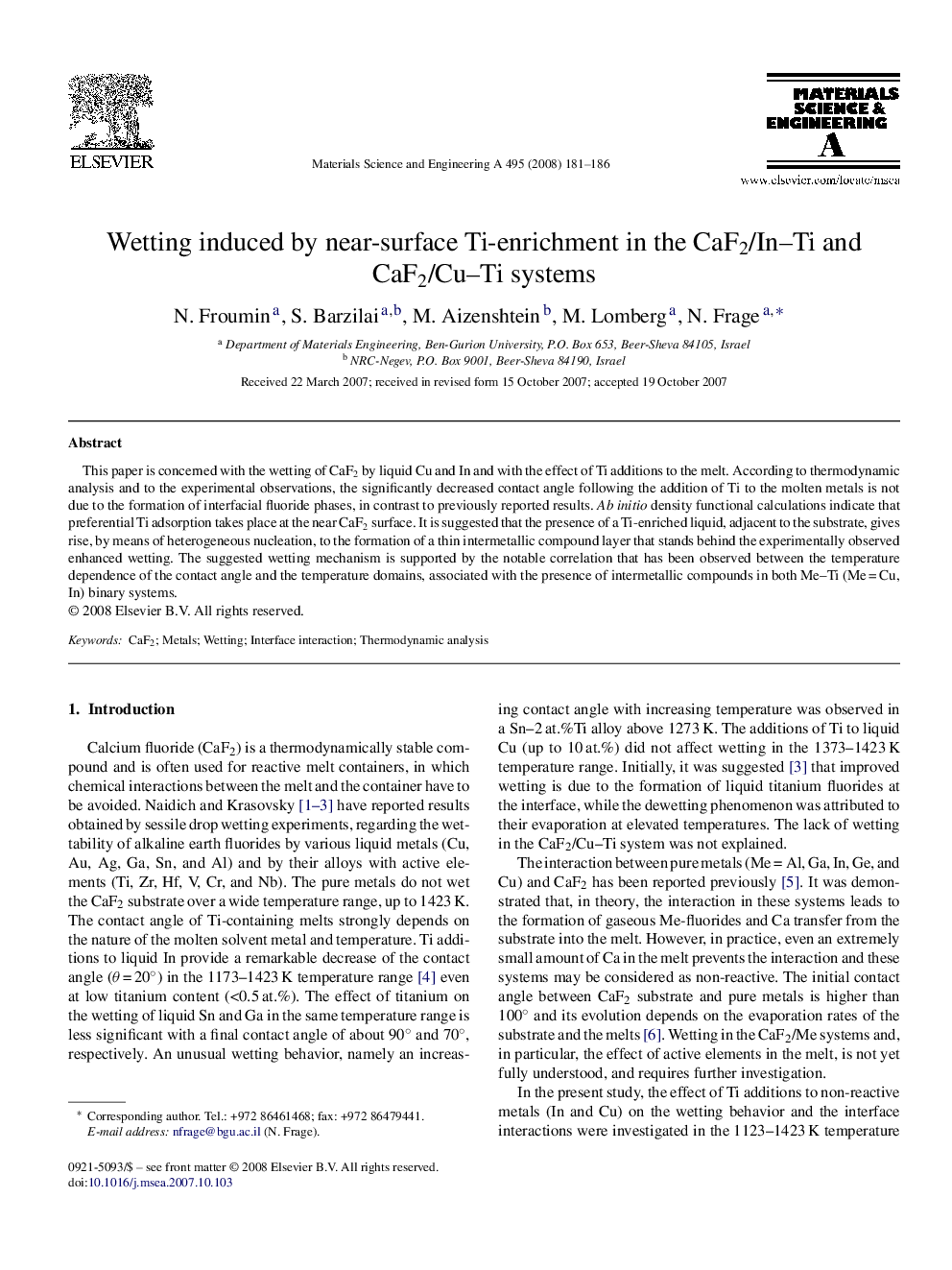 Wetting induced by near-surface Ti-enrichment in the CaF2/In–Ti and CaF2/Cu–Ti systems