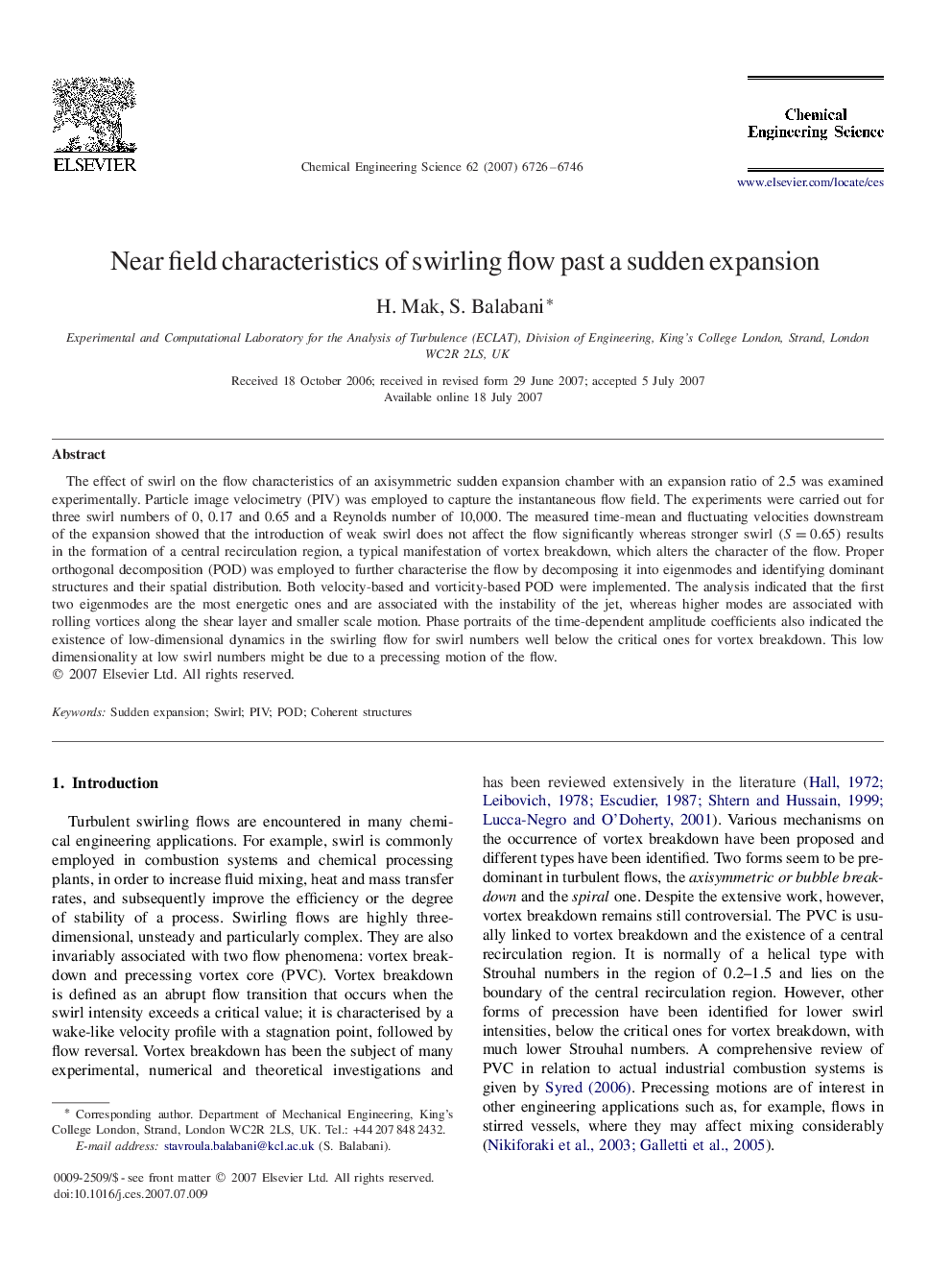 Near field characteristics of swirling flow past a sudden expansion