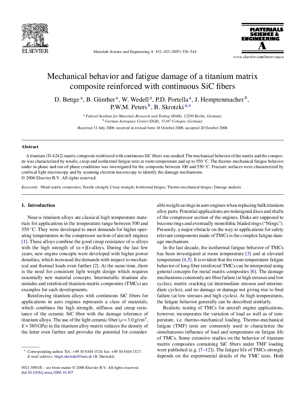 Mechanical behavior and fatigue damage of a titanium matrix composite reinforced with continuous SiC fibers