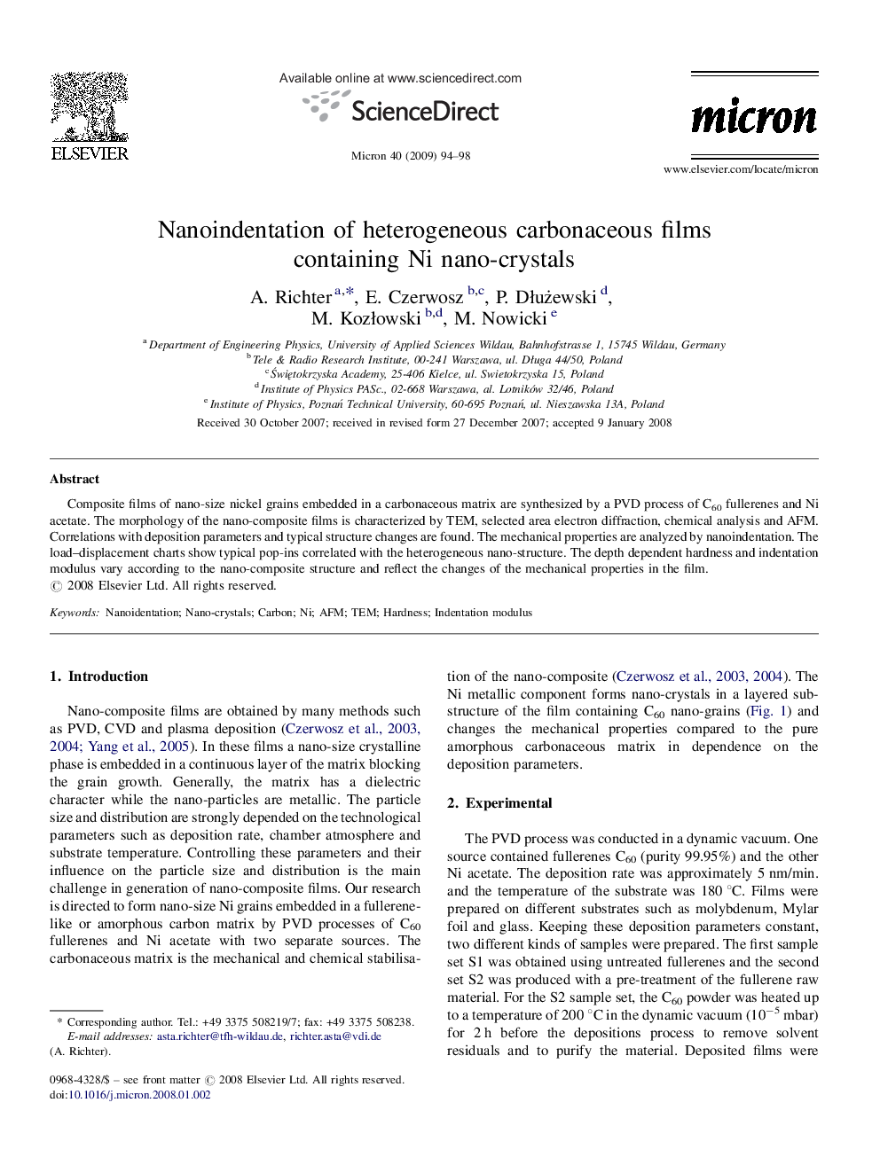 Nanoindentation of heterogeneous carbonaceous films containing Ni nano-crystals