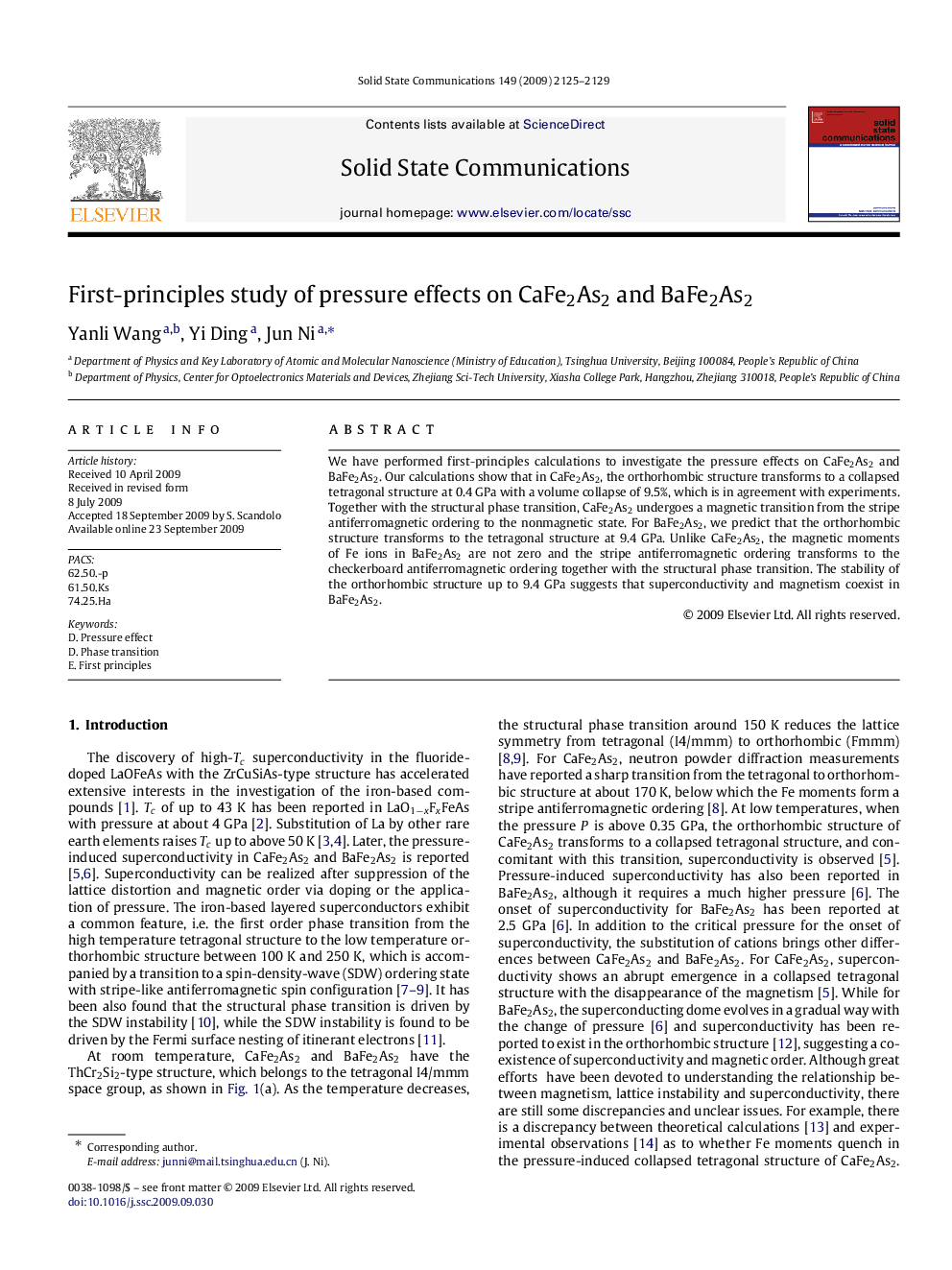 First-principles study of pressure effects on CaFe2As2 and BaFe2As2