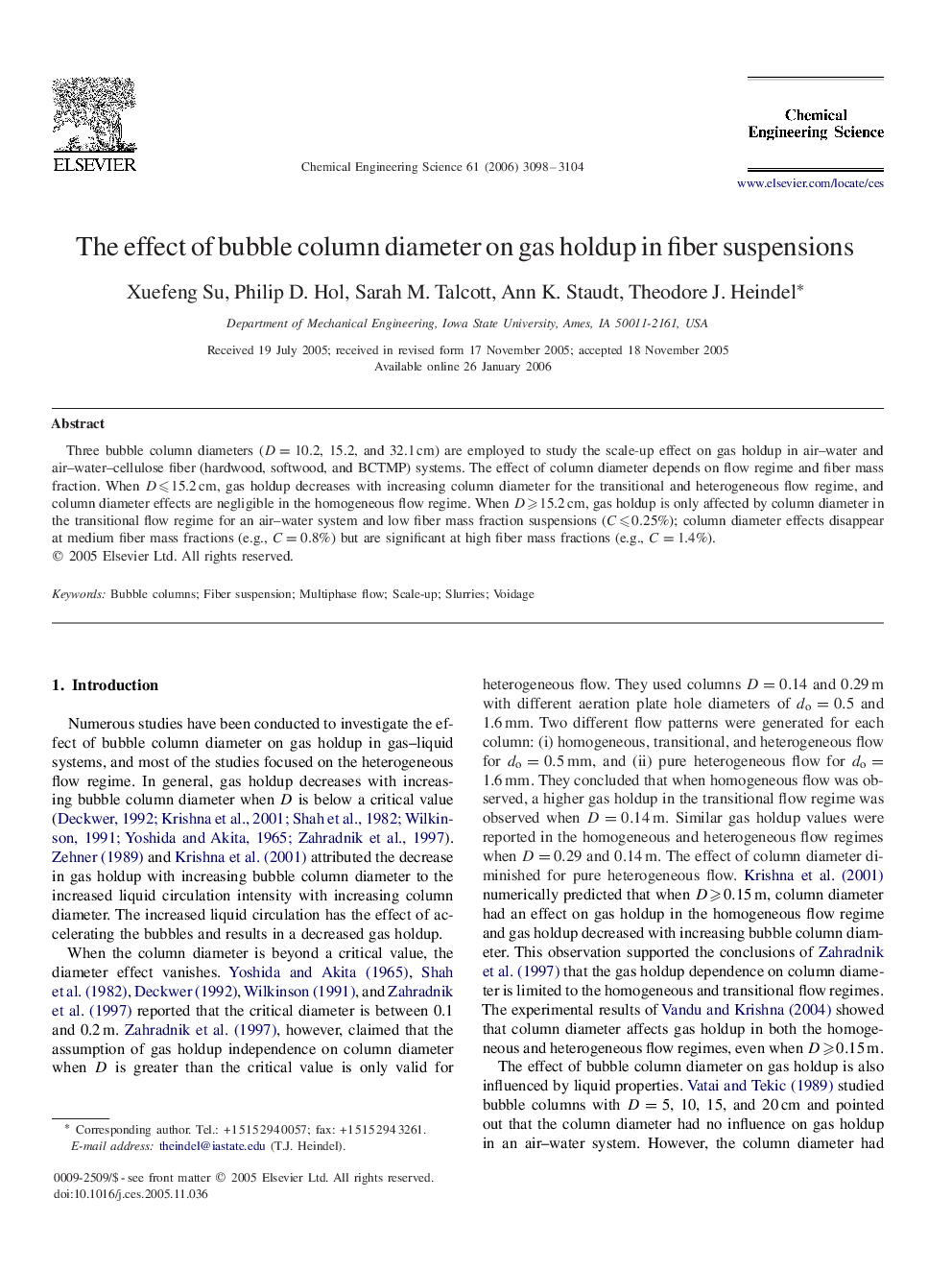 The effect of bubble column diameter on gas holdup in fiber suspensions