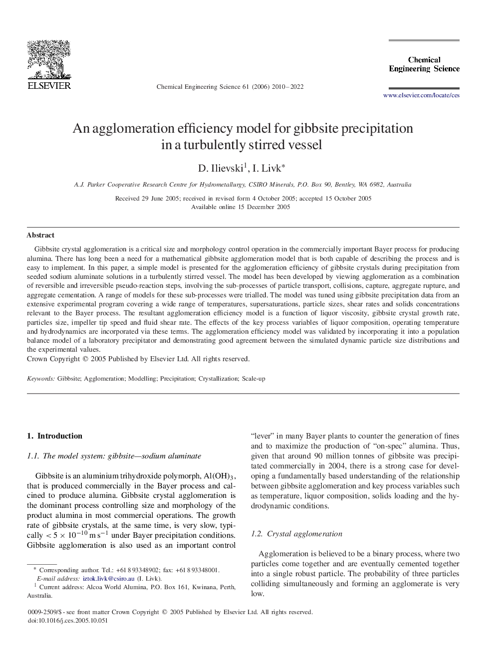 An agglomeration efficiency model for gibbsite precipitation in a turbulently stirred vessel