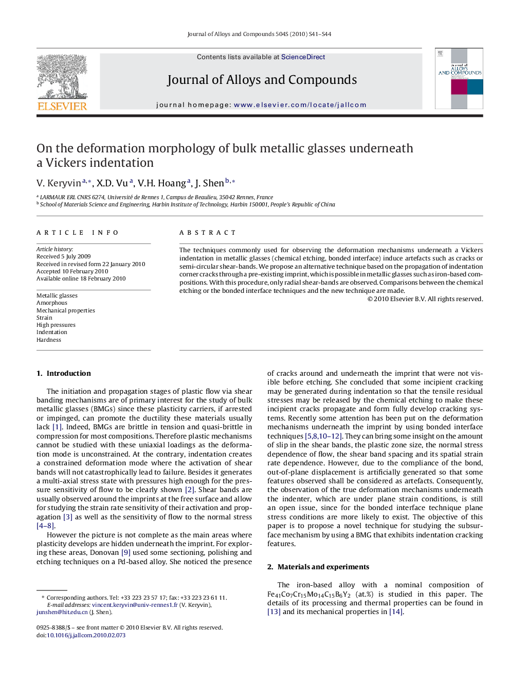 On the deformation morphology of bulk metallic glasses underneath a Vickers indentation